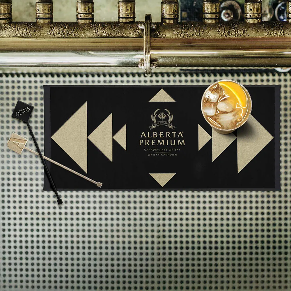 Bar countertop with Alberta Premium branding and cocktail Alberta