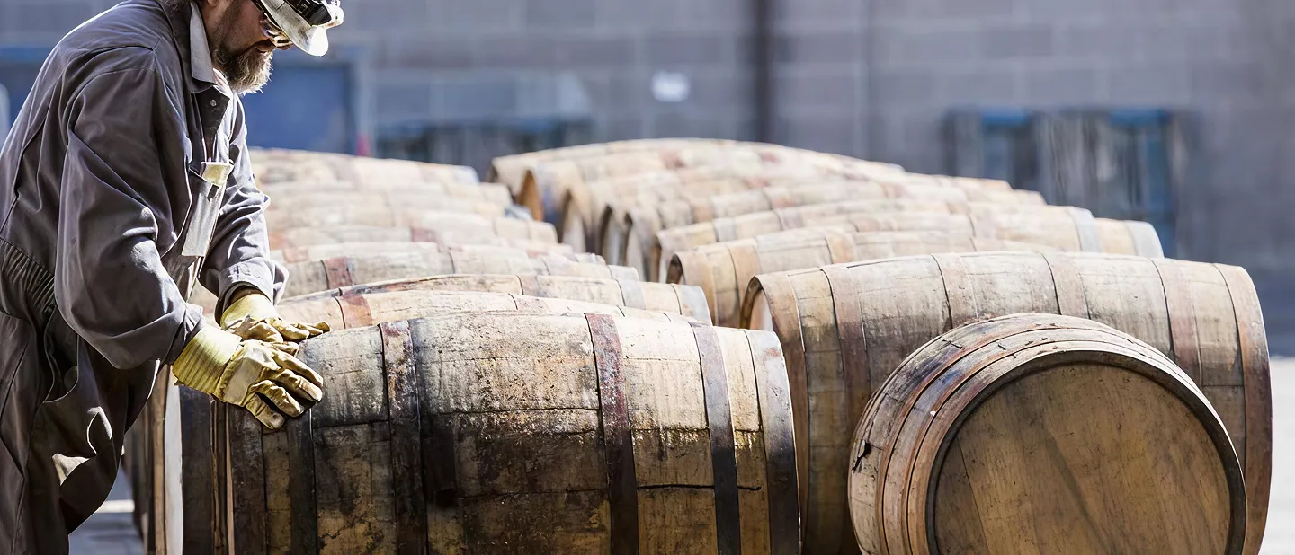 man-working-barrells-alberta